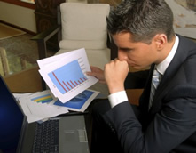 Photo: man at computer