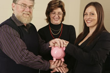 Photo: Family with piggy bank